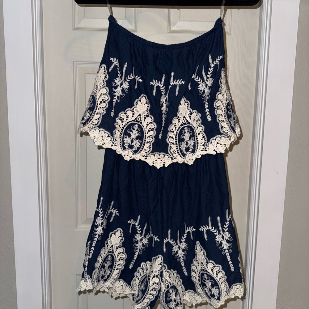4/$20 Alya Navy Romper with White Lace Embellishments